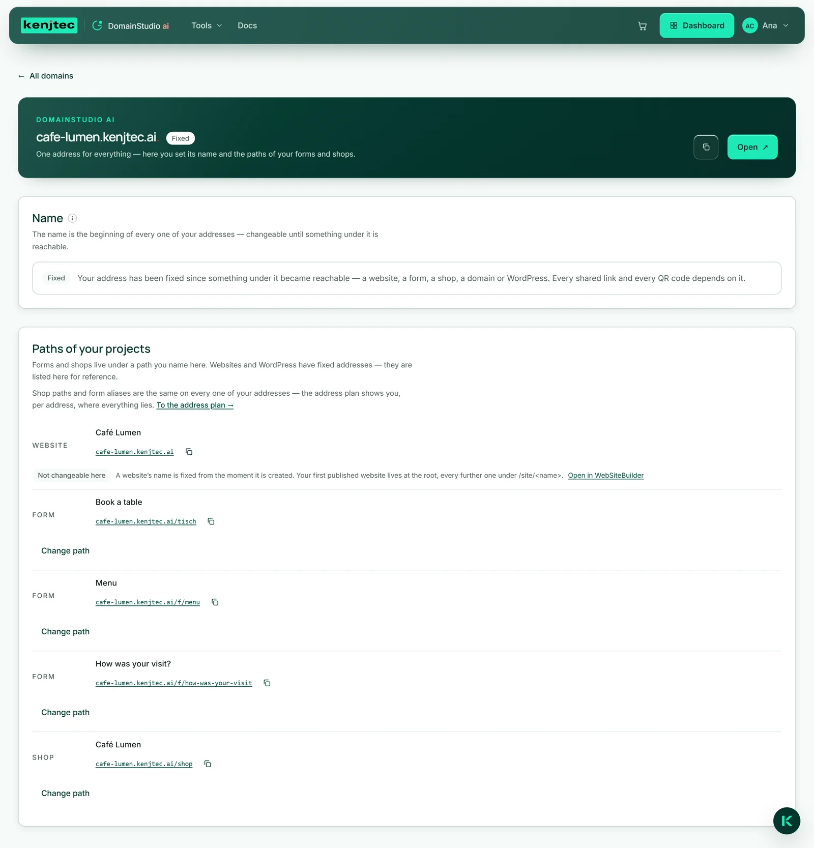 The page of the address cafe-lumen.kenjtec.ai: the “Fixed” pill in the “Name” section, below it “Paths of your projects” with the shop and the “Book a table” form.